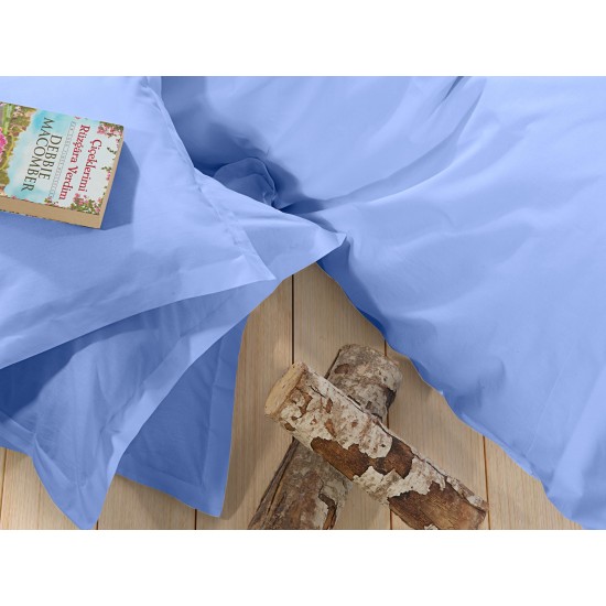 Lenjerie de pat Albastra din bumbac fabricată cu atenție la detalii în atelierul propriu.