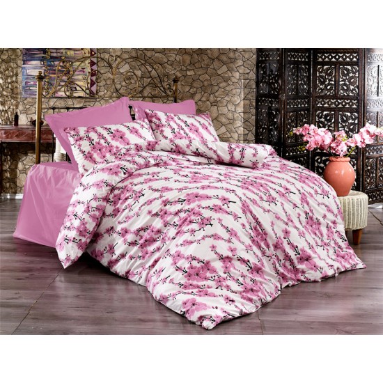 Lenjerie de pat cu flori din bumbac fabricată cu atenție la detalii în atelierul propriu.