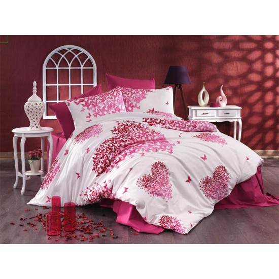 Lenjerie de pat cu inimioare din bumbac fabricată cu atenție la detalii în atelierul propriu.