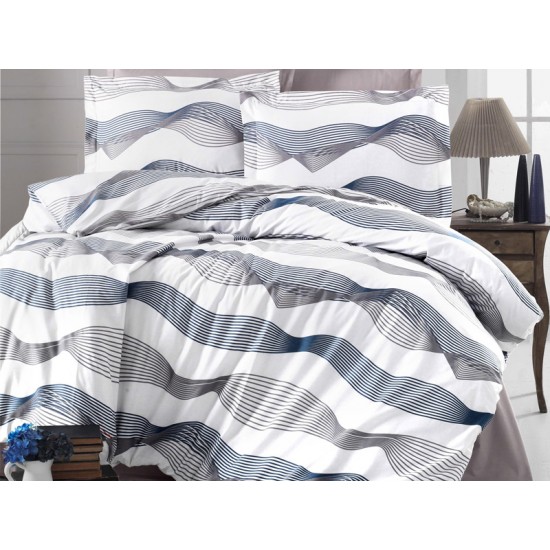 Lenjerie de pat Waves din bumbac fabricată cu atenție la detalii în atelierul propriu.